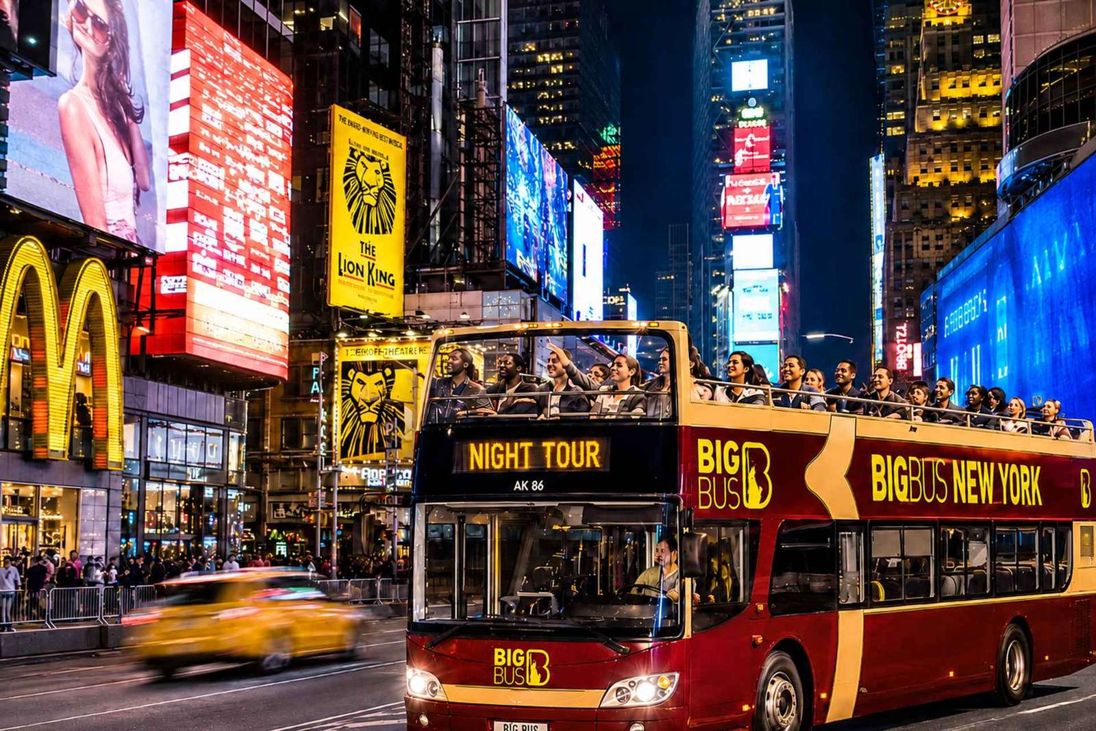 NYC: giro turistico notturno in autobus scoperto con guida dal vivo